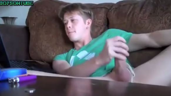 Straight guy wanking on couch
