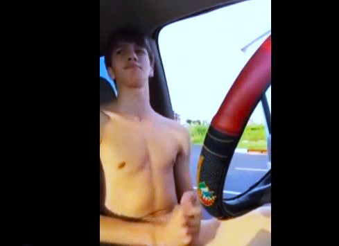 Warren jerking off and cumming in the car on the highway
