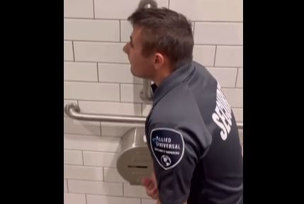 Guard jerking off in the toilet